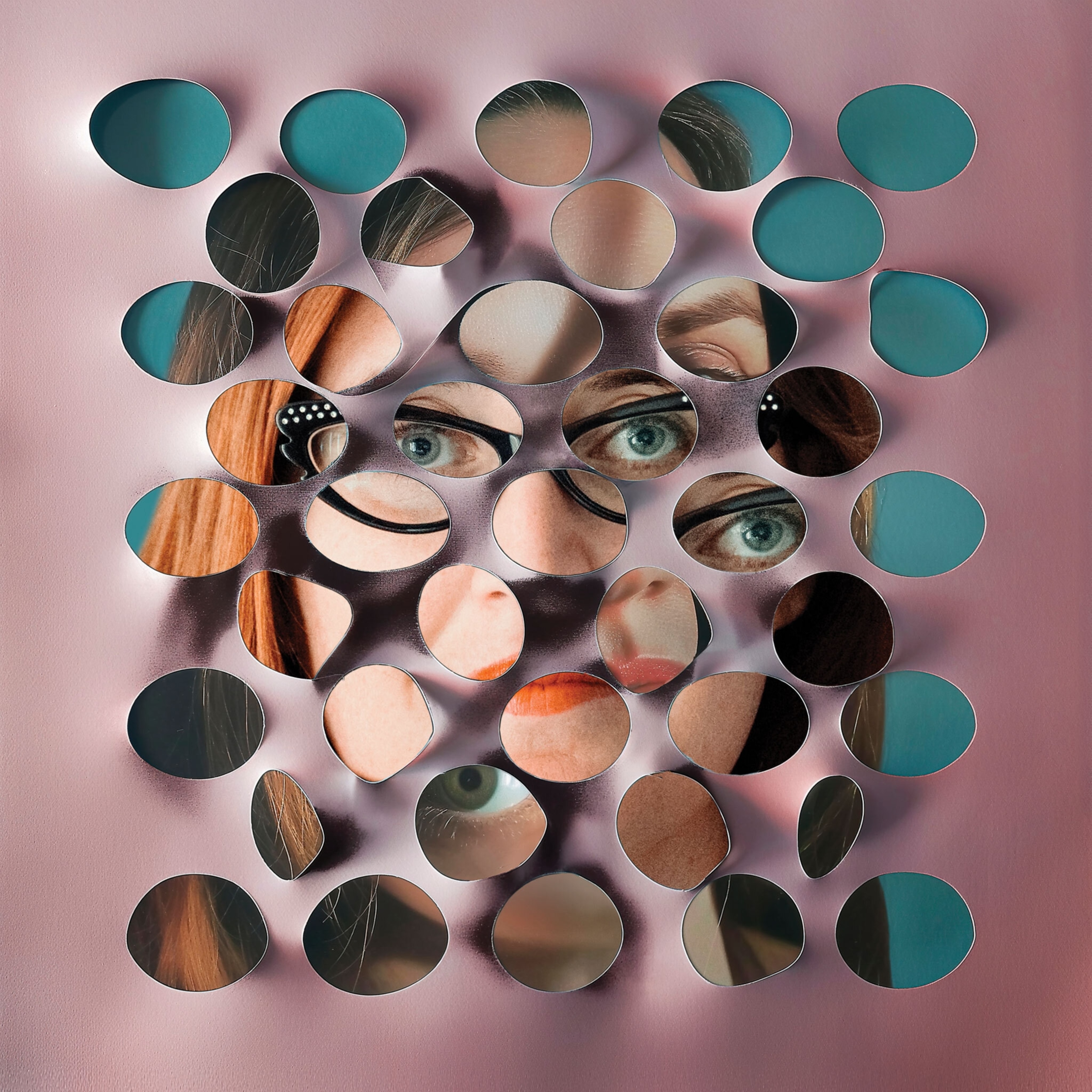 A pink layer with holes in it on top of an abstract photo of a woman wearing glasses